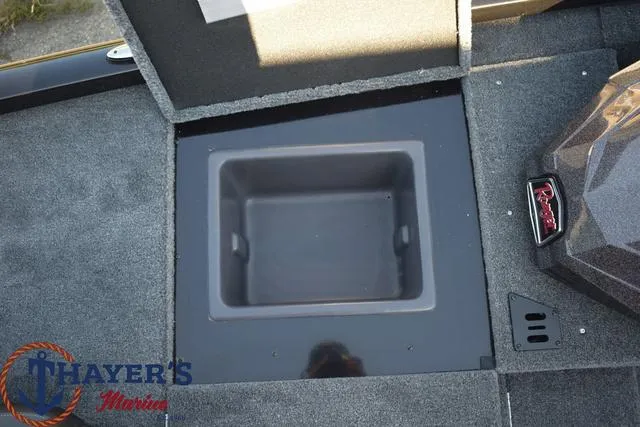 Slide: The Image of 2024 Ranger RT178 boat storage compartment with Thayer's Marine logo. - 19