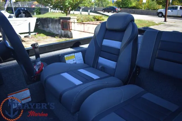 Slide: The Image of 2024 Ranger RT178 boat interior with gray and black seats at Thayer's Marine. - 20