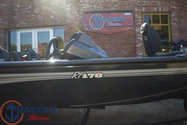 Slide: The Image of 2024 Ranger RT178 boat at Thayer's Marine dealership. - 7