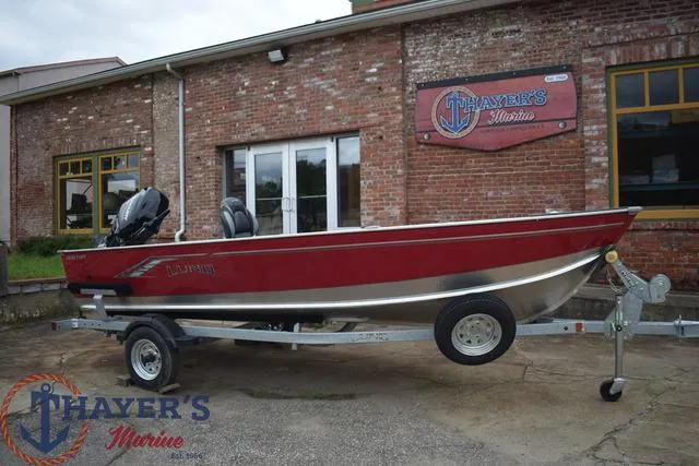 Slide: The Image of 2024 Lund 1600 Fury Tiller boat on trailer at Thayer's Marine. - 19