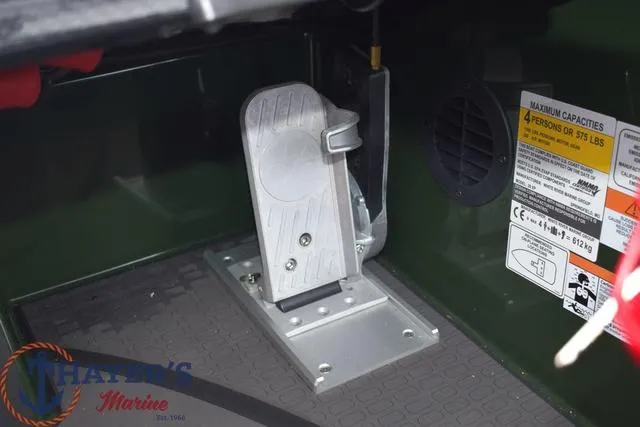 Slide: The Image of Foot pedal control in a 2024 Triton 20XP boat, displayed at Thayer's Marine. - 12