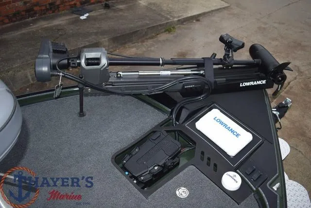 Slide: The Image of 2024 Triton 20XP boat with Lowrance equipment and Thayer's Marine logo. - 13