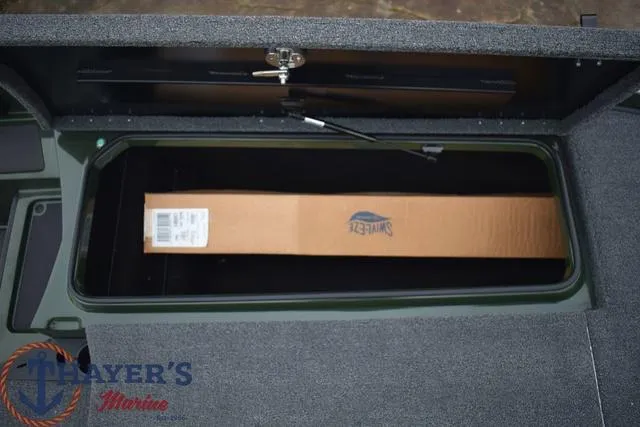 Slide: The Image of Storage compartment of a 2024 Triton 20XP boat with a Swivl-Eze box inside. - 14
