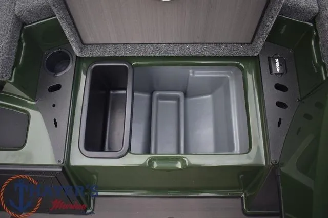 Slide: The Image of 2024 Triton 20XP boat storage compartments and cup holder. - 17