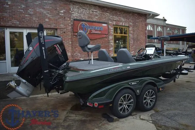 Slide: The Image of 2024 Triton 20XP boat on trailer at Thayer's Marine. - 27