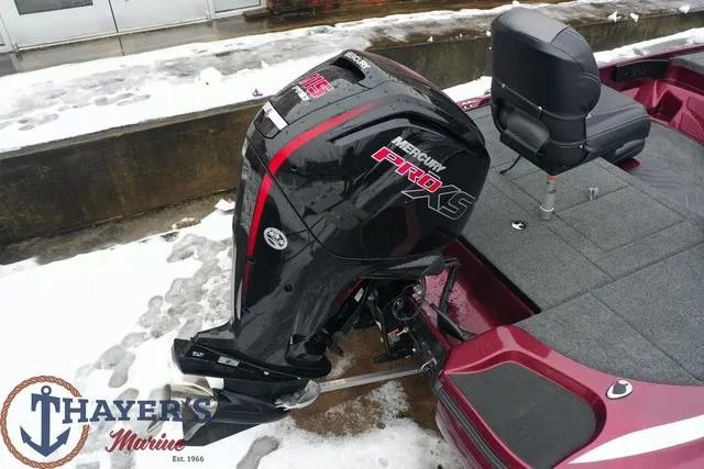 Slide: The Image of 2024 Nitro Z17 boat with Mercury Pro XS outboard motor in snowy setting. Thayer's Marine logo visible. - 10