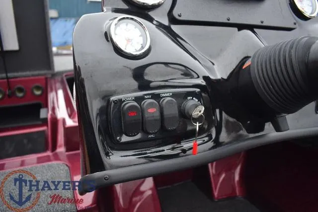 Slide: The Image of Control panel of a 2024 Nitro Z17 boat with Thayer's Marine logo. - 15