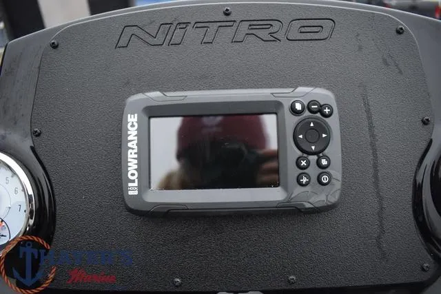 Slide: The Image of Nitro Z17 2024 dashboard with Lowrance fishfinder and gauges. - 17