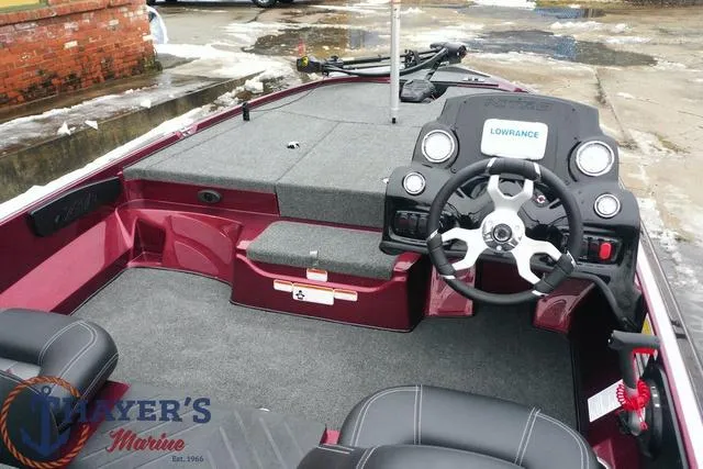 Slide: The Image of 2024 Nitro Z17 boat interior with steering wheel and Lowrance electronics. - 35