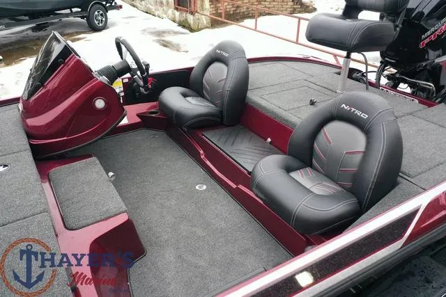 Slide: The Image of 2024 Nitro Z17 boat interior with dual seats and steering console. - 37