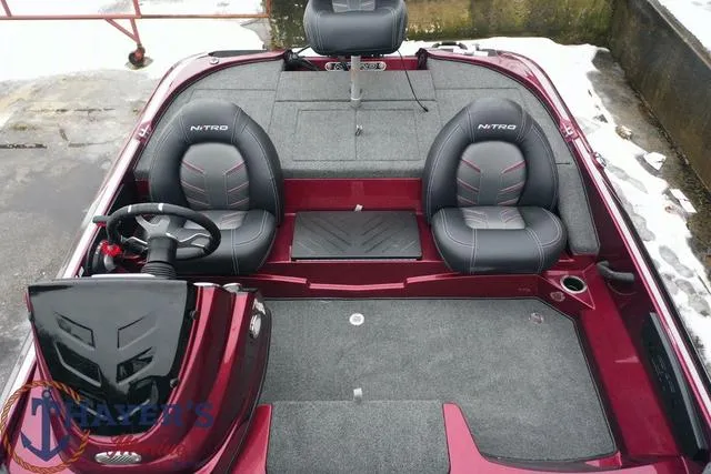 Slide: The Image of 2024 Nitro Z17 boat interior with dual seats and steering console. - 7