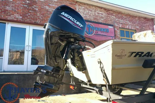 Slide: The Image of 2024 Tracker GRIZZLY® 1754 SC boat with Mercury outboard motor at Thayer's Marine. - 4