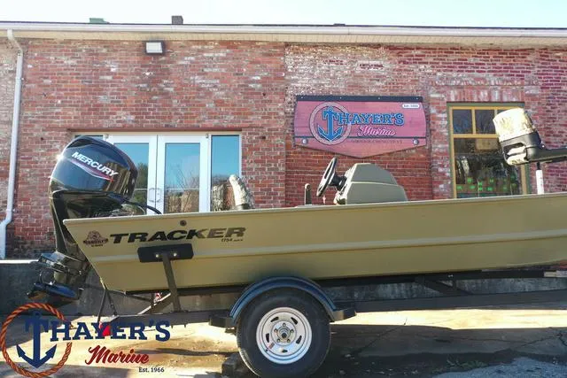 Slide: The Image of 2024 Tracker GRIZZLY® 1754 SC boat at Thayer's Marine dealership. - 6
