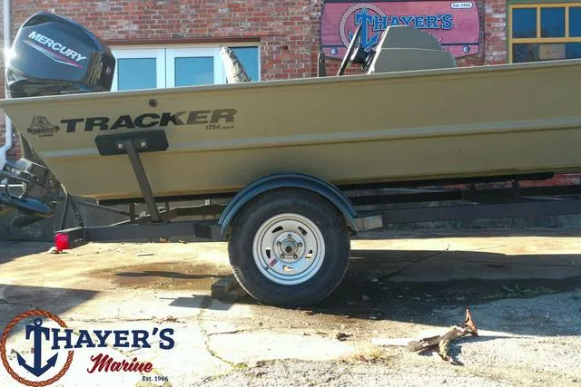 Slide: The Image of 2024 Tracker GRIZZLY® 1754 SC boat on trailer at Thayer's Marine. - 7