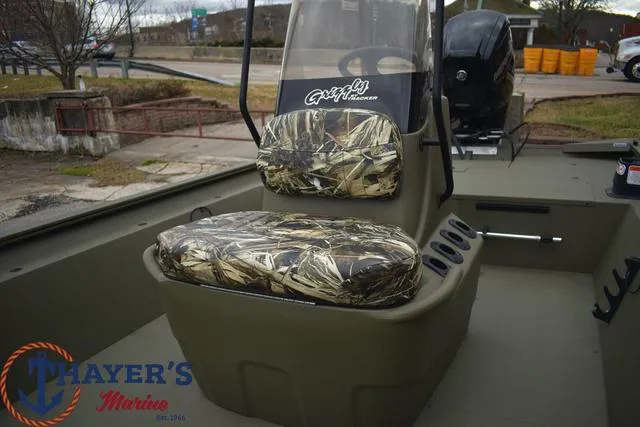 Slide: The Image of 2024 Tracker GRIZZLY® 1860 CC boat with camo seats at Thayer's Marine. - 11