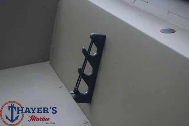 Slide: The Image of Rod holder on 2024 Tracker GRIZZLY® 1860 CC boat, Thayer's Marine logo. - 16