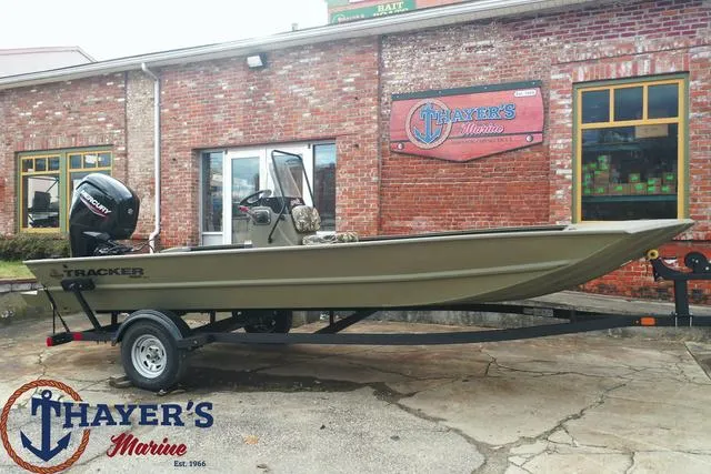Slide: The Image of 2024 Tracker GRIZZLY® 1860 CC boat on trailer at Thayer's Marine. - 17