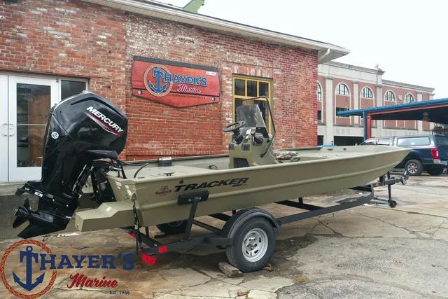 Slide: The Image of 2024 Tracker GRIZZLY® 1860 CC boat on trailer at Thayer's Marine. - 18