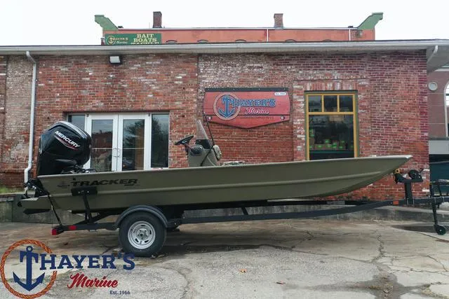 Slide: The Image of 2024 Tracker GRIZZLY® 1860 CC boat on trailer at Thayer's Marine. - 19