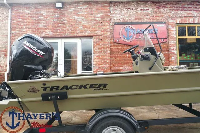 Slide: The Image of 2024 Tracker GRIZZLY® 1860 CC boat with Mercury engine at Thayer's Marine. - 5