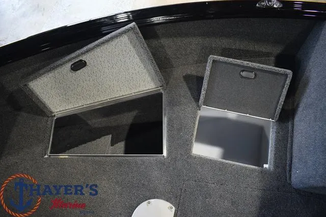 Slide: The Image of Storage compartments on the 2024 Lund 1875 Impact XS Sport boat. - 14