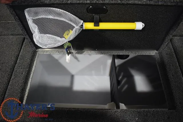 Slide: The Image of Storage compartment of 2024 Lund 1875 Impact XS Sport boat with fishing net and tackle. - 25