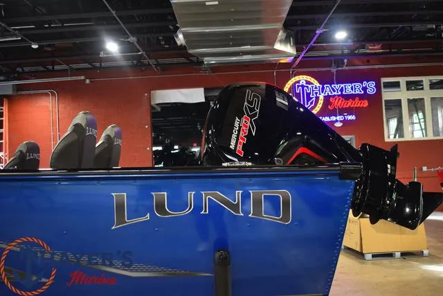Slide: The Image of 2024 Lund 1875 Impact XS Sport boat with Mercury engine at Thayer's Marine. - 5