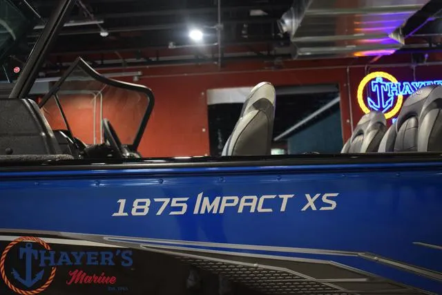 Slide: The Image of 2024 Lund 1875 Impact XS Sport boat at Thayer's Marine showroom. - 6