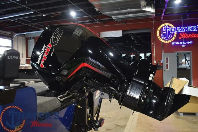 Slide: The Image of 2024 Lund 1875 Impact XS Sport boat with Mercury Pro XS engine at Thayer's Marine. - 9