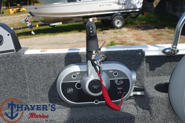 Slide: The Image of Control panel of a 2024 Lund 1675 Adventure Sport boat at Thayer's Marine. - 16