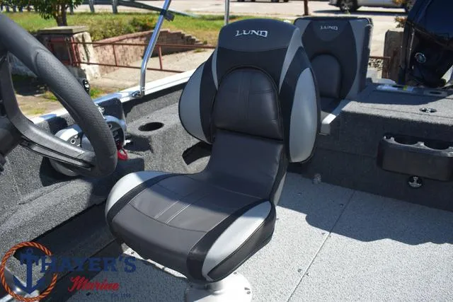 Slide: The Image of 2024 Lund 1675 Adventure Sport boat interior with comfortable seating. - 18