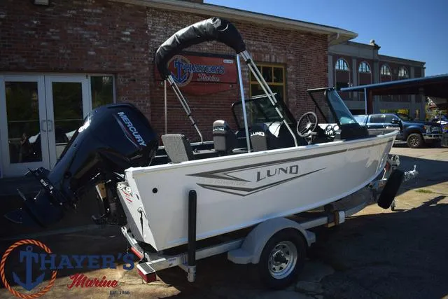 Slide: The Image of 2024 Lund 1675 Adventure Sport boat on trailer at Thayer's Marine. - 23