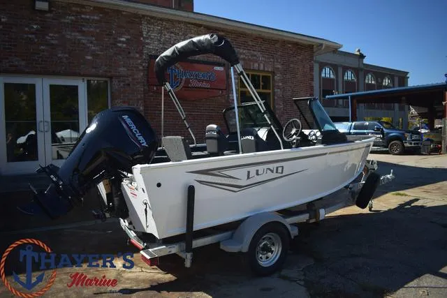Slide: The Image of 2024 Lund 1675 Adventure Sport boat on trailer at Thayer's Marine. - 3