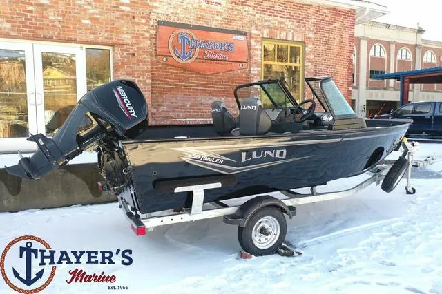Slide: The Image of 2024 Lund 1650 Angler Sport boat on trailer at Thayer's Marine dealership. - 3