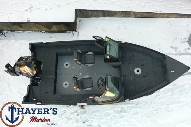 Slide: The Image of 2024 Lund 1650 Angler Sport boat on snowy ground at Thayer's Marine. - 4