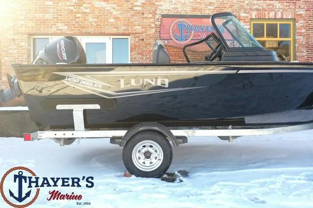 Slide: The Image of 2024 Lund 1650 Angler Sport boat on trailer at Thayer's Marine. - 7