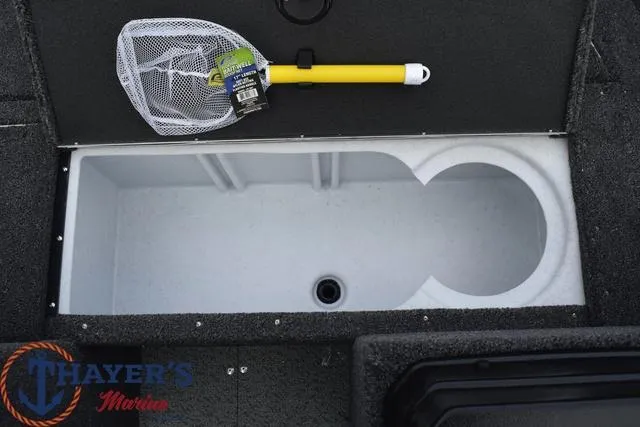 Slide: The Image of 2024 Lund 1650 Angler Sport livewell with fishing net and rod holder. - 13