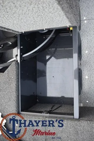 Slide: The Image of 2024 Lund 1650 Angler Sport storage compartment at Thayer's Marine. - 15