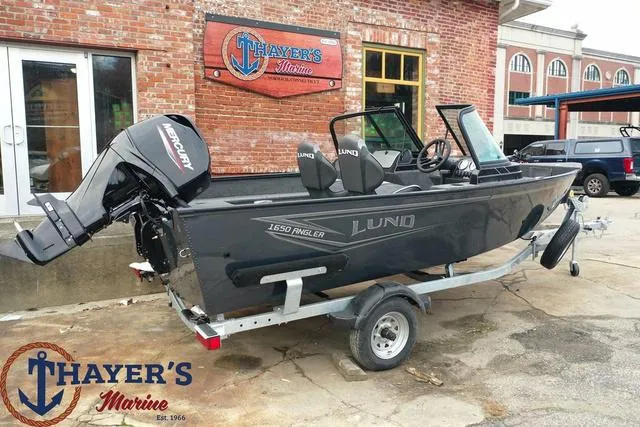 Slide: The Image of 2024 Lund 1650 Angler Sport boat at Thayer's Marine dealership. - 3