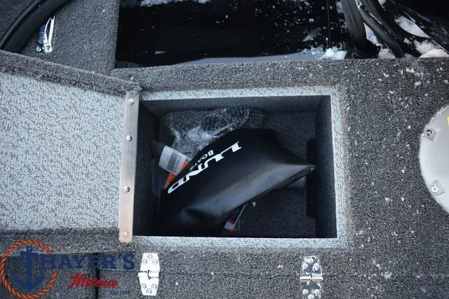 Slide: The Image of 2024 Lund 1650 Rebel XL Sport storage compartment with Lund accessory bag. - 14