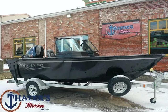 Slide: The Image of 2024 Lund 1650 Rebel XL Sport boat on trailer at Thayer's Marine. - 18