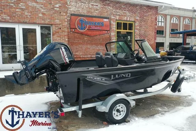 Slide: The Image of 2024 Lund 1650 Rebel XL Sport boat at Thayer's Marine dealership. - 19