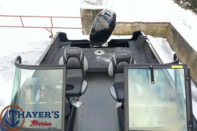 Slide: The Image of 2024 Lund 1650 Rebel XL Sport boat interior with Thayer's Marine logo. - 23