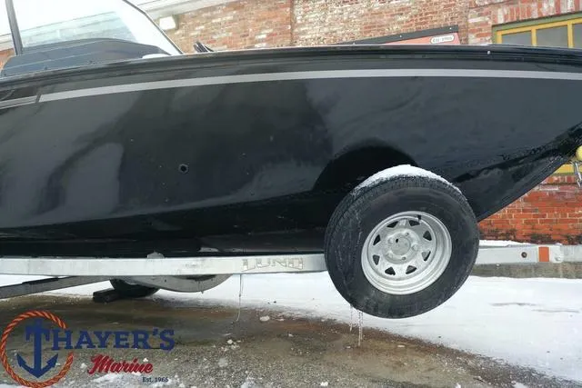 Slide: The Image of 2024 Lund 1650 Rebel XL Sport boat on trailer at Thayer's Marine. - 27