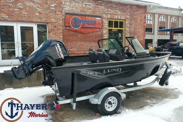 Slide: The Image of 2024 Lund 1650 Rebel XL Sport boat at Thayer's Marine dealership. - 3