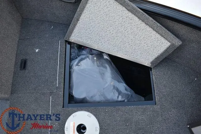 Slide: The Image of 2024 Lund 1650 Rebel XL Sport storage compartment at Thayer's Marine. - 8