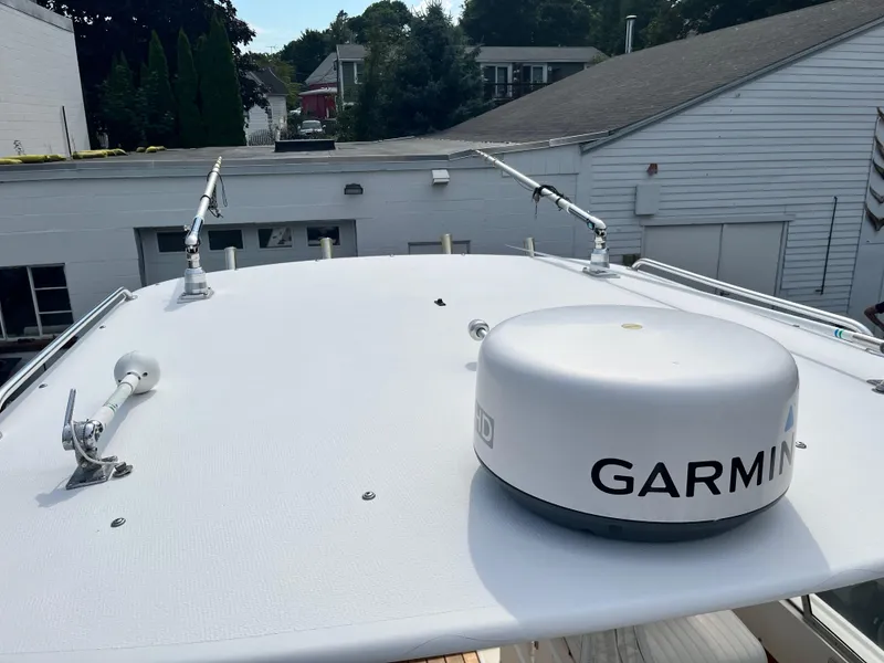 Slide: The Image of 1977 Bertram 26 Moppie boat with Garmin radar on the roof. - 21