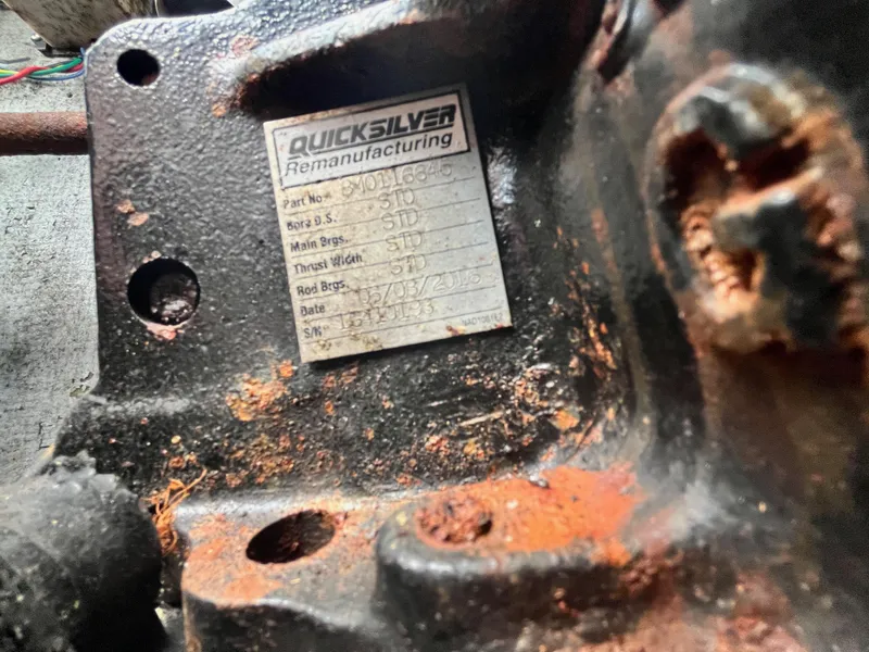 Slide: The Image of Rusty engine part with Quicksilver remanufacturing label, Bertram 26 Moppie 1977. - 22