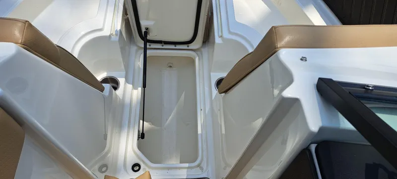 Slide: The Image of 2019 Sea Ray SPX 230 OB boat interior storage compartment. - 33