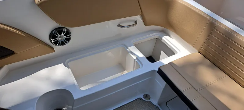 Slide: The Image of 2019 Sea Ray SPX 230 OB boat interior storage compartments and seating. - 35